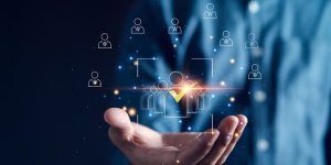 HRM or Human Resource Management, Businessman holding magnifier select and accept to manager icon which is among staff icons for human development recruitment leadership and customer target group.