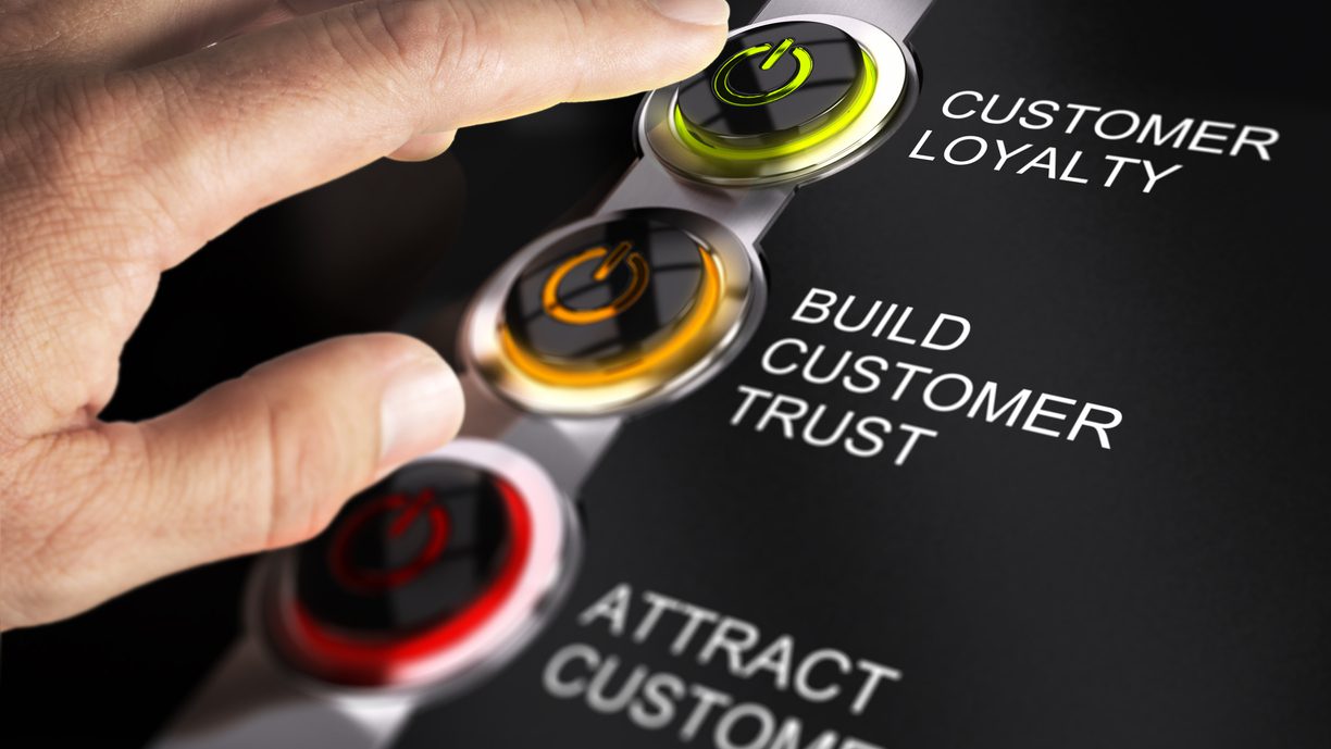 Finger about to press customer loyalty button. Concept for illustration of sales process.
