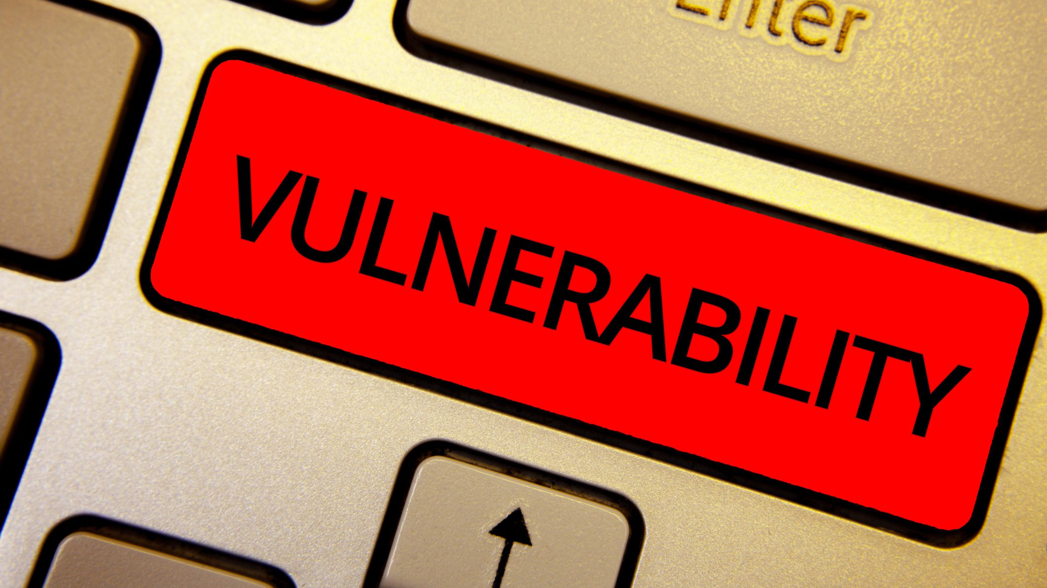Text sign showing Vulnerability. Conceptual photo Information susceptibility systems bug exploitation attacker Keyboard brown keys yellow laptop idea create computer keypad laptop