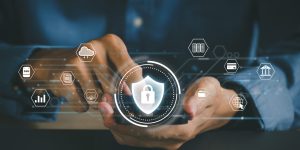 Concept of cyber security, information security, and encryption, secure access to user's personal information, Man using his mobile selects the icon security on the virtual display. cybersecurity.