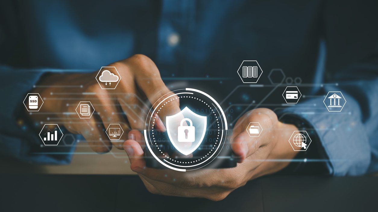 Concept of cyber security, information security, and encryption, secure access to user's personal information, Man using his mobile selects the icon security on the virtual display. cybersecurity.