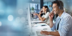 Contact us, mockup or happy consultant in a call center helping, talking or networking online in office. Smile, man or insurance agent in communication or conversation at customer services or sales