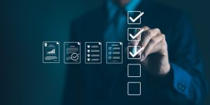 Quality Assurance and Document Control with Checklist Icons. Businessman mark off items on digital checklist, representing quality assurance and document control processes, verification and compliance
