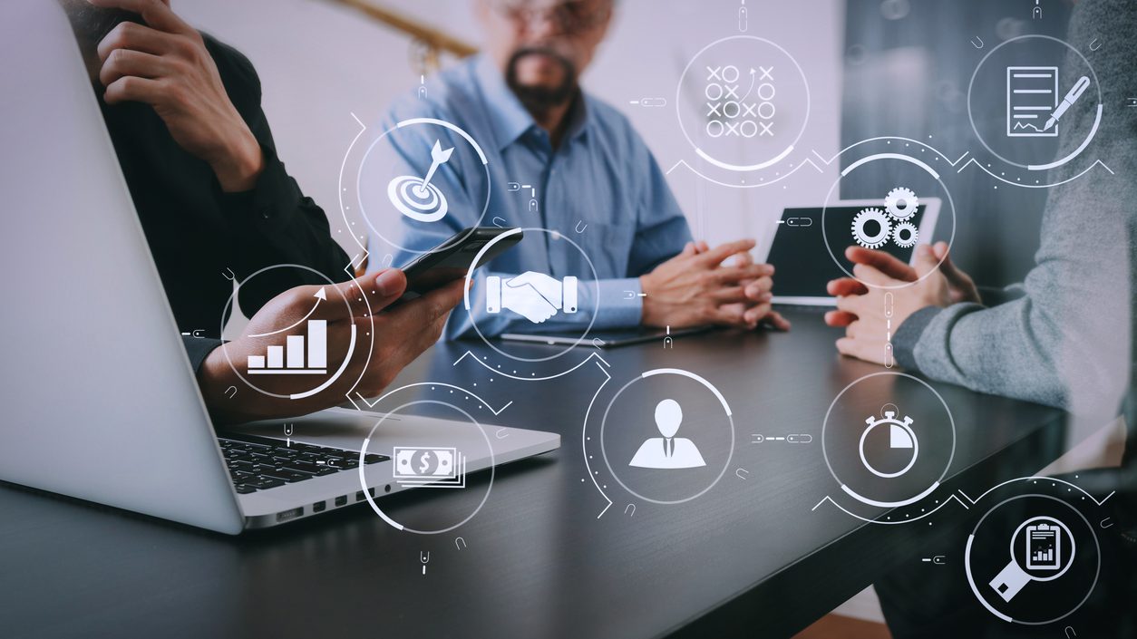 Business process management with workflow automation diagram and gears in virtual flowchart.co working team meeting concept,businessman using smart phone and digital tablet and laptop computer in modern office