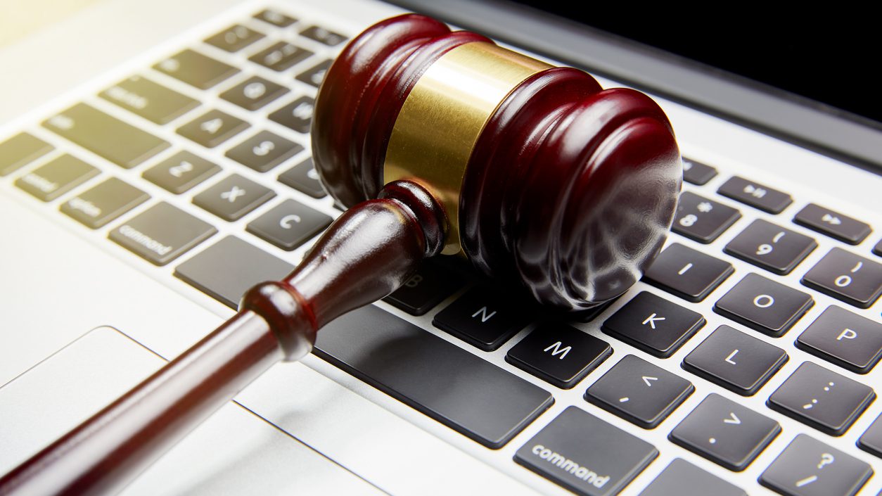 GAVEL ON COMPUTER KEYBOARD