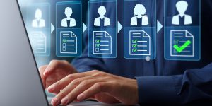 Approval workflow and business process management BPM. Document approval process and completion. Businessman using laptop computer to approve legal documents.