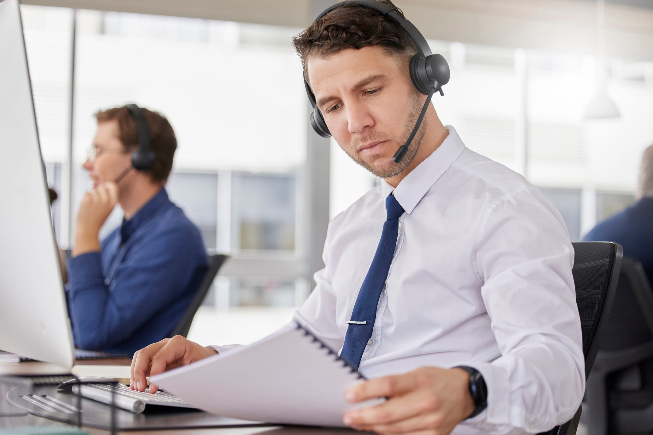 Call center, business man and corporate paperwork of a telemarketing employee with a document