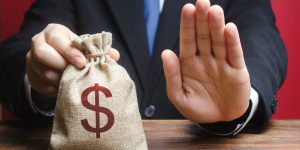 Businessman refuses to give a money bag