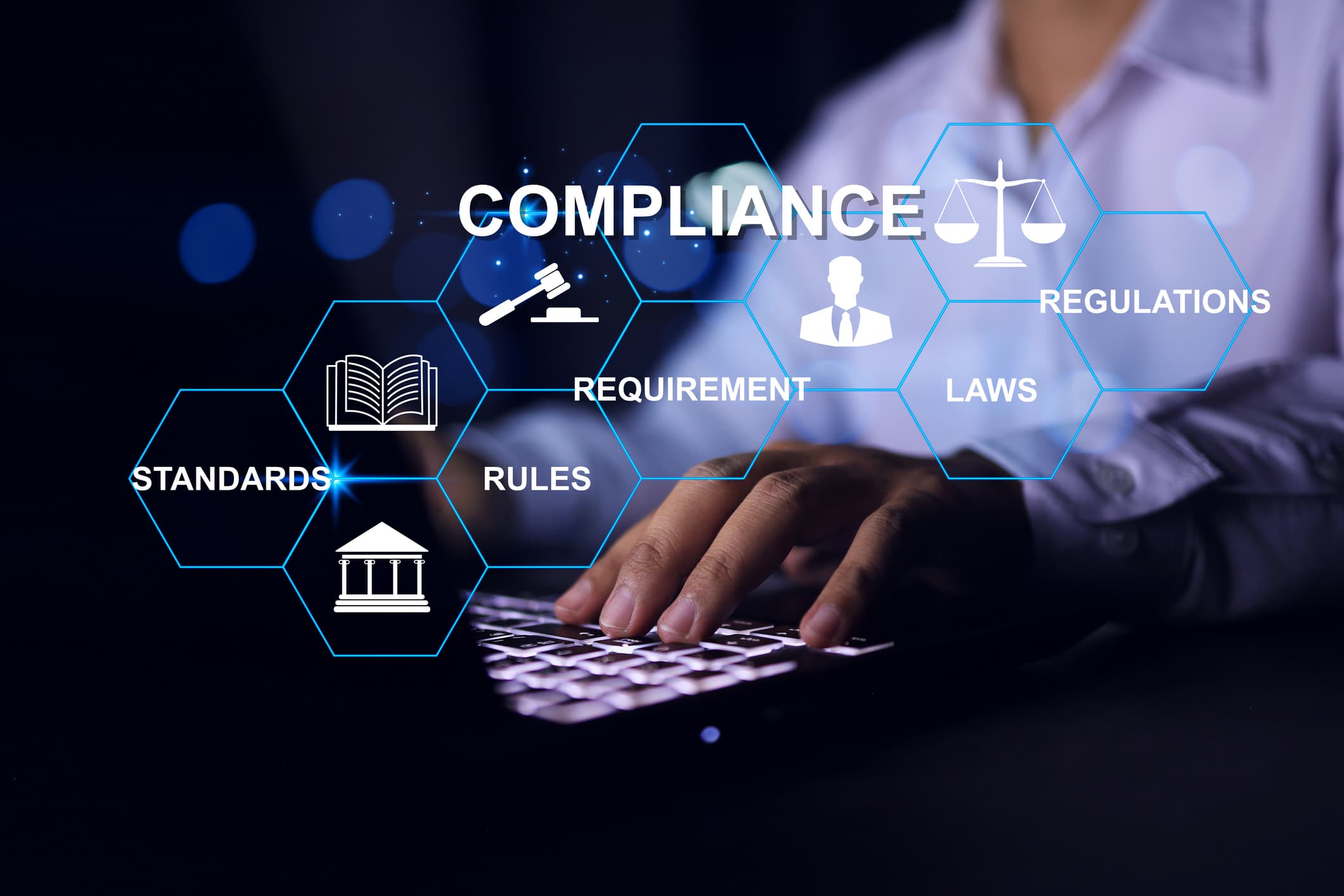 Compliance concept with businessman working with laptop to apply requirement for standard regulation